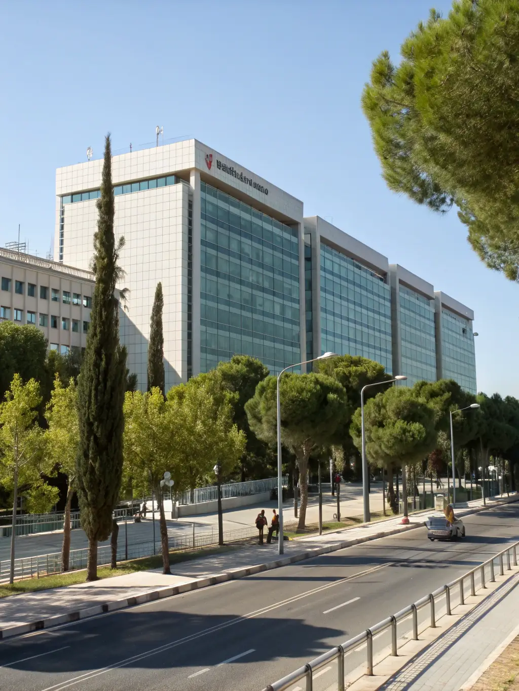 A photograph of the Andalusian Health Service headquarters in Seville, Spain, emphasizing its role in regional public health administration.